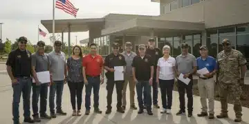 Diverse group of veterans smiling outside a community center, symbolizing enhanced benefits and support in 2025.